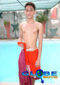 Slim sporty asian boy model poolside